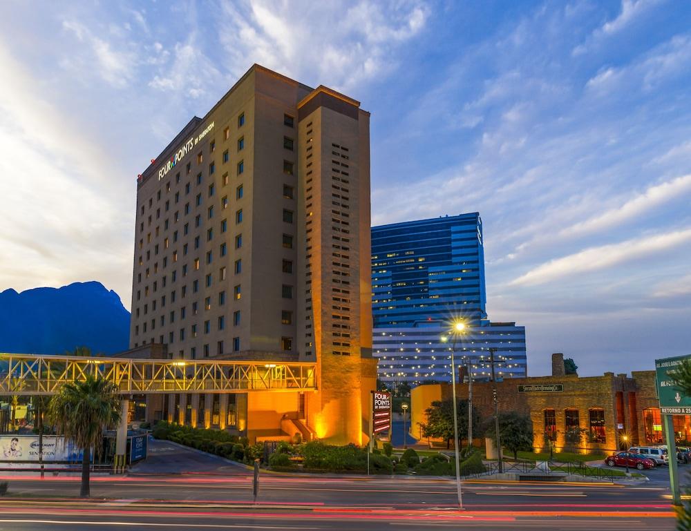 Four Points By Sheraton Galerias Μοντερέι Εξωτερικό φωτογραφία The hotel at dusk