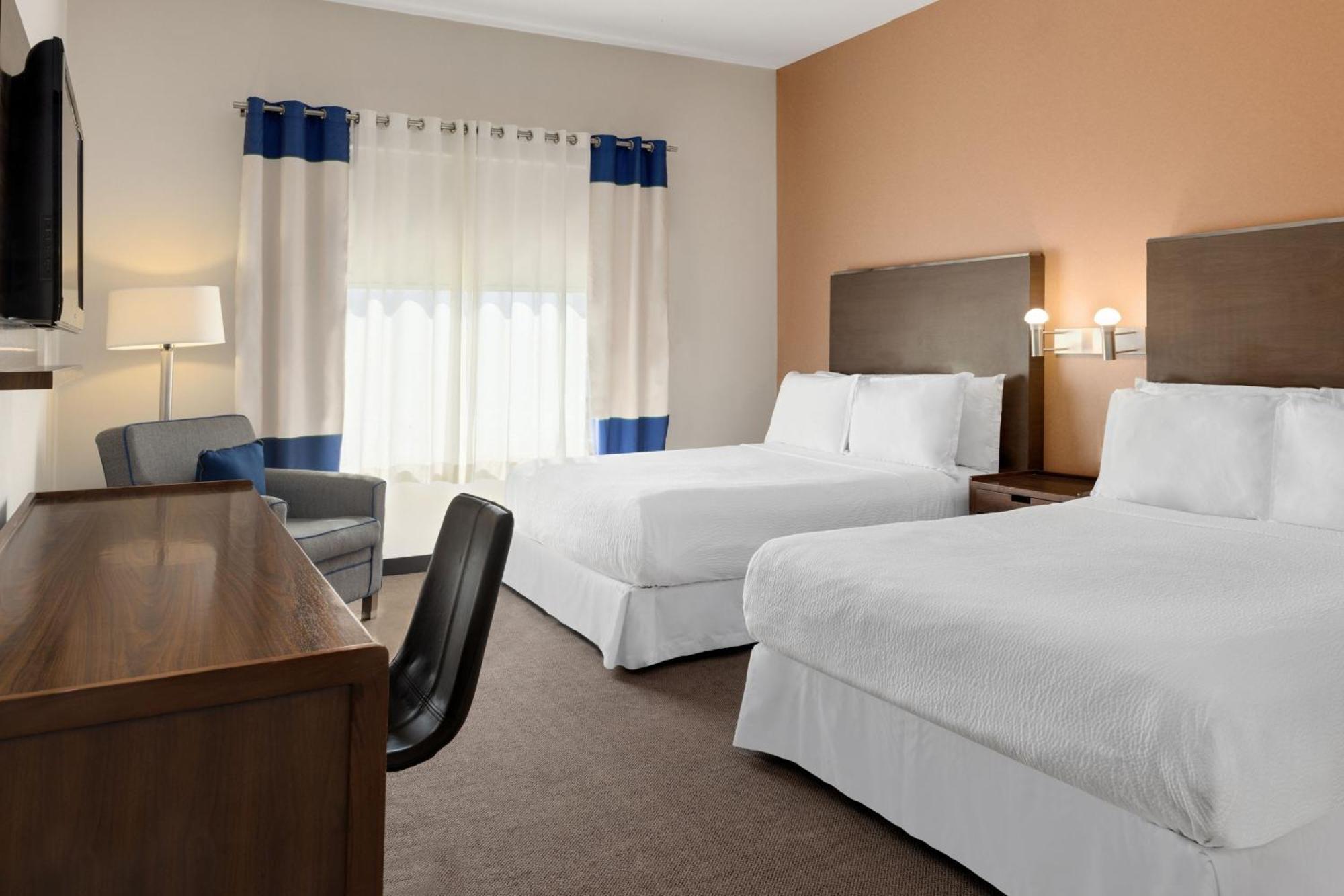 Four Points By Sheraton Galerias Μοντερέι Εξωτερικό φωτογραφία A typical guest room at an extended stay hotel